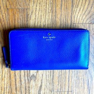 Kate Spade wallet cobalt blue leather with gold zip around. Great used condition